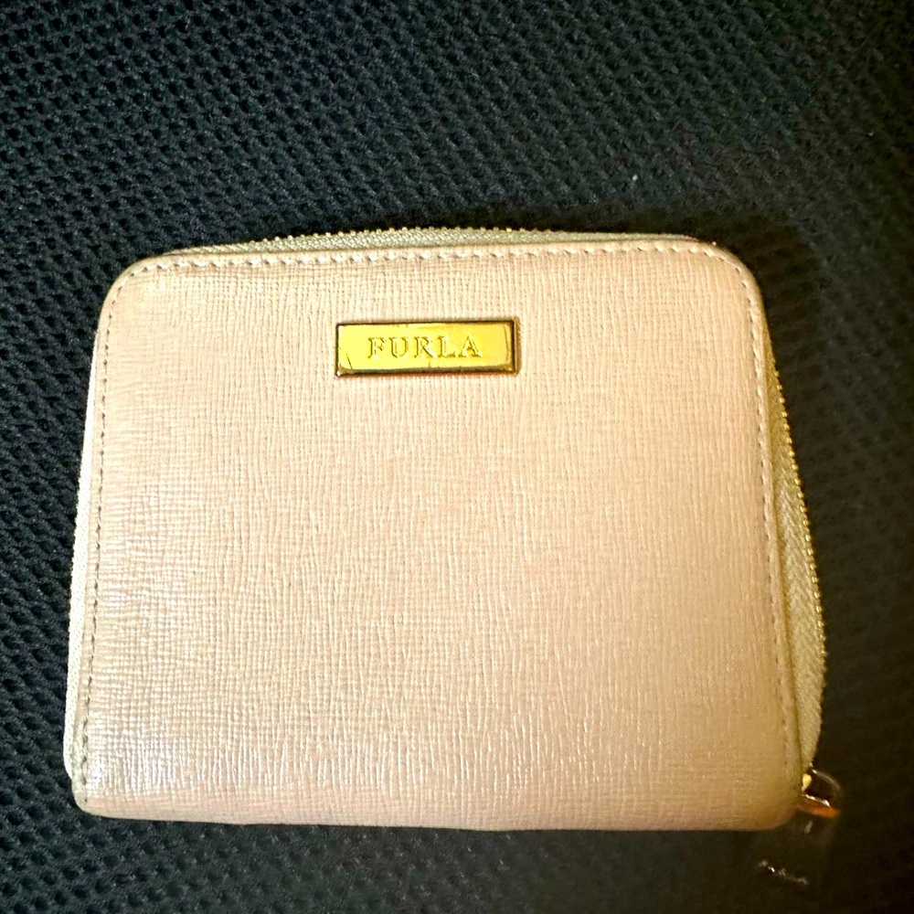 Furla wallet size 4x4.5 in pink. Beautiful condition.